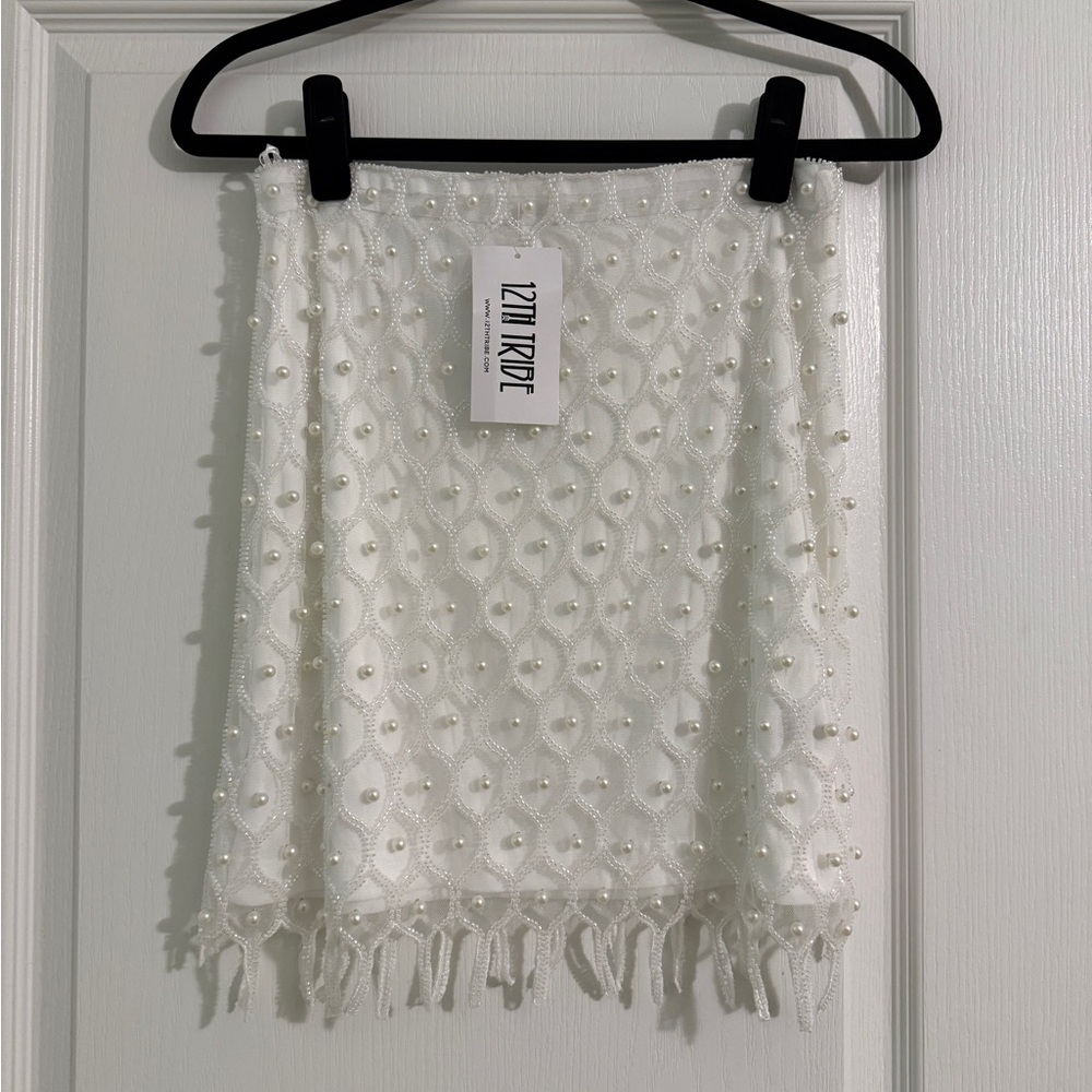 Pearl embellished mini skirt